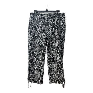 ZENERGY BY CHICO’s Black Animal Print Capris Size 1 (same as Medium 8) NICE!!